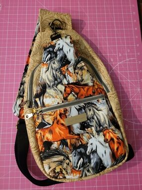 Galloping Horses Sling Mini Backpack with Tan Trim